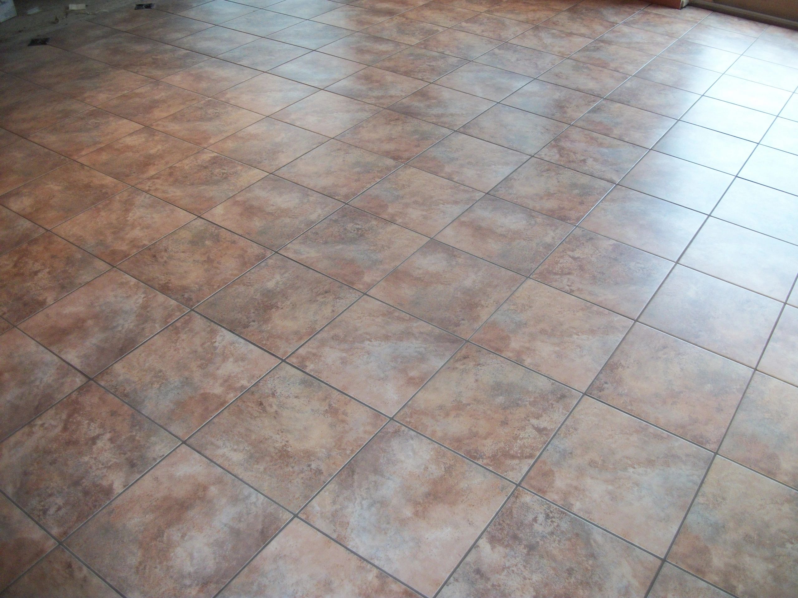 Tile floor close-up warm earth tones