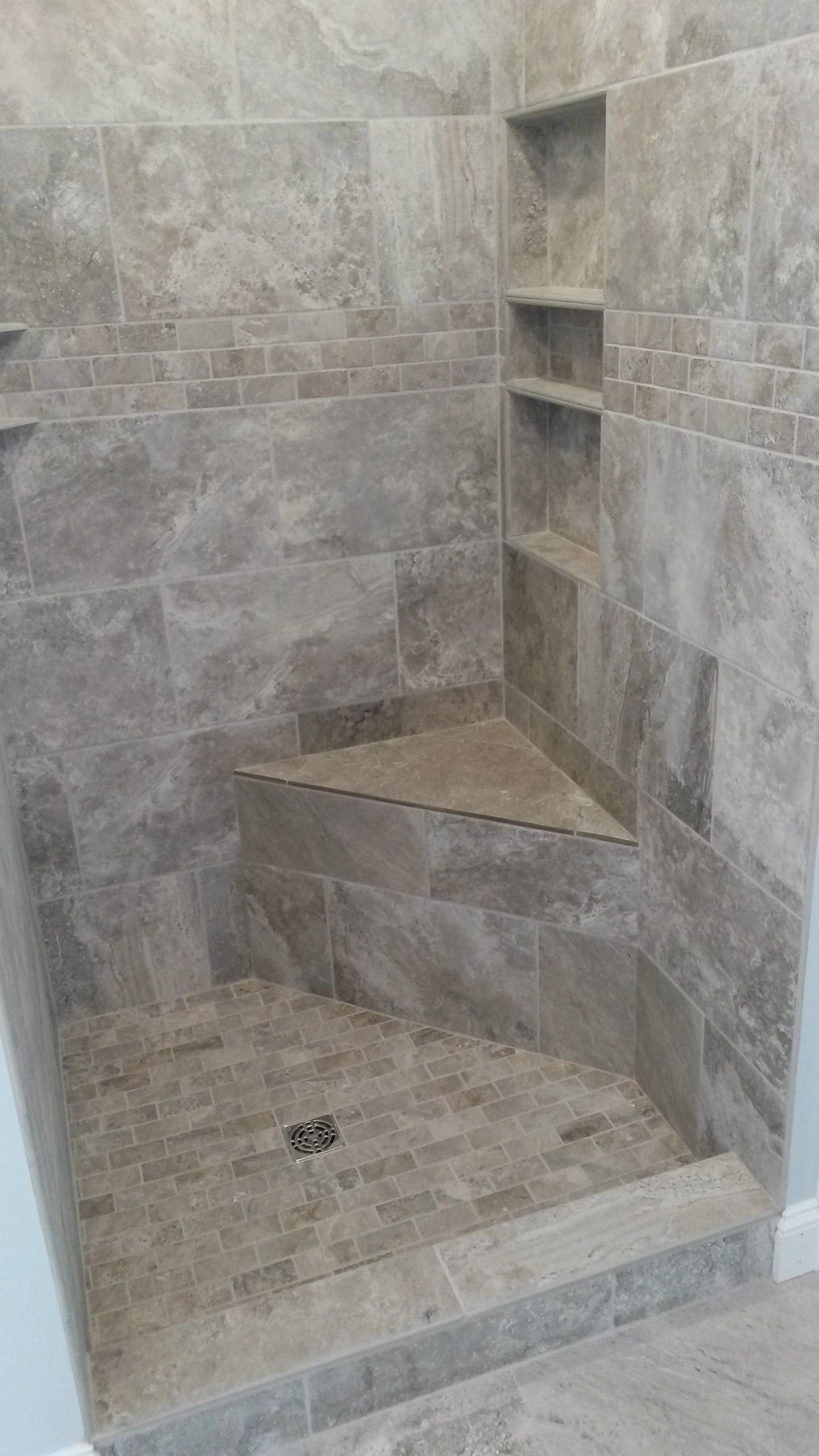 Modern shower enclosure gray travertine tile