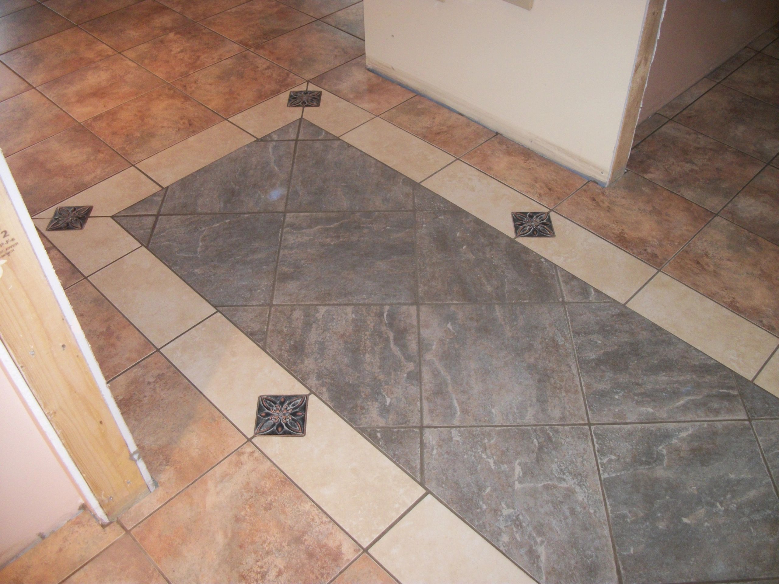 Decorative tile floor geometric border